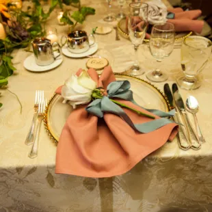 Pantone Color of the Year Peach Fuzz Napkin Fold with Rose