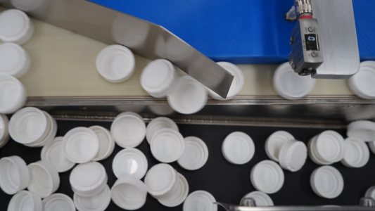 Opposing Conveyors for product singulation