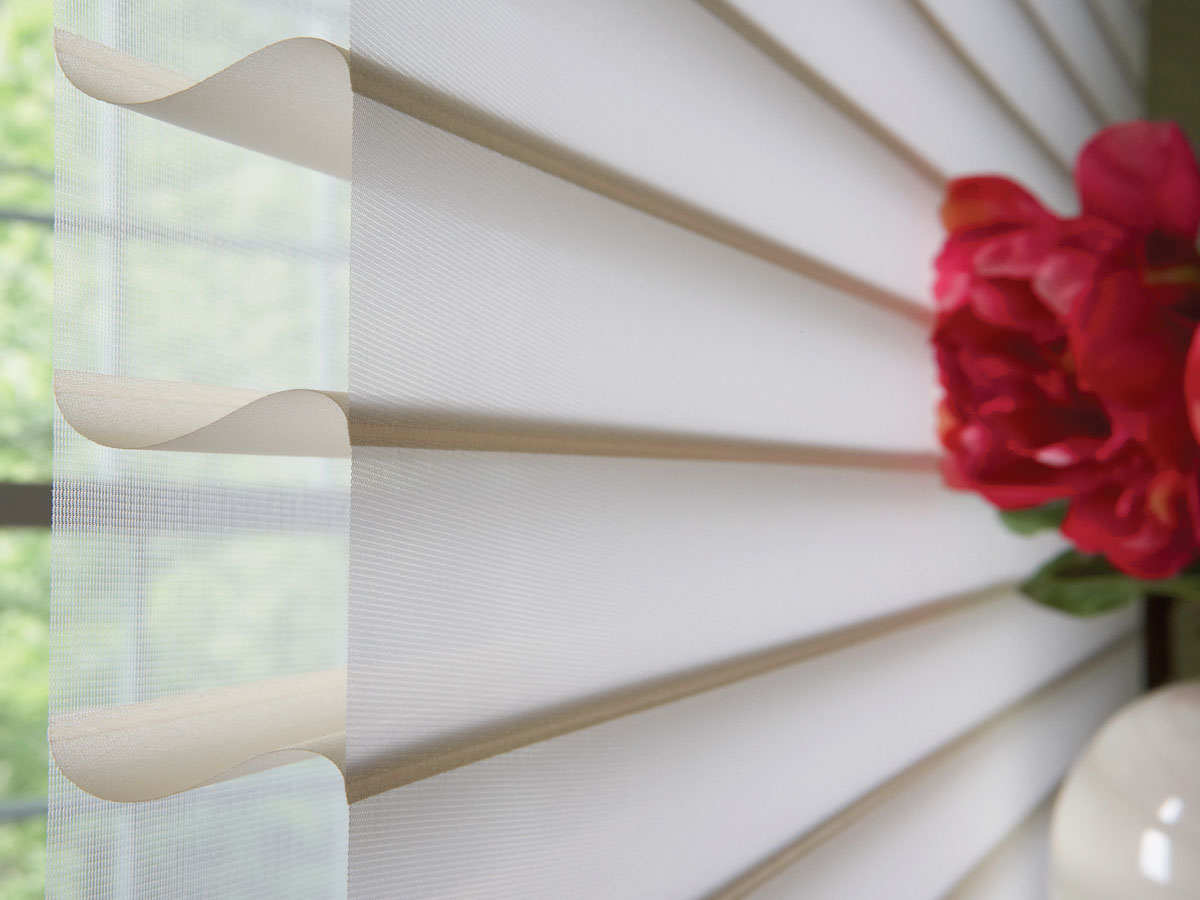 Close up view of a cream colored Tenera® Sheer Shading material