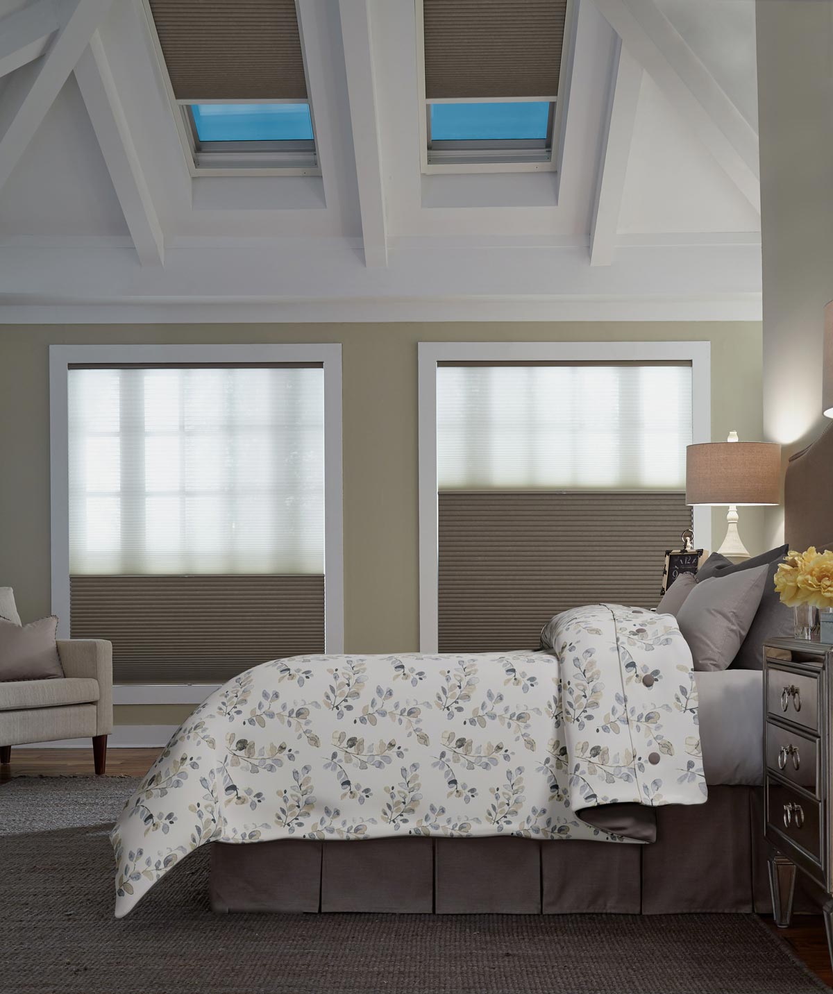 Parasol® Cellular Shades in windows behind a bed with Interior Masterpieces® custom bedding