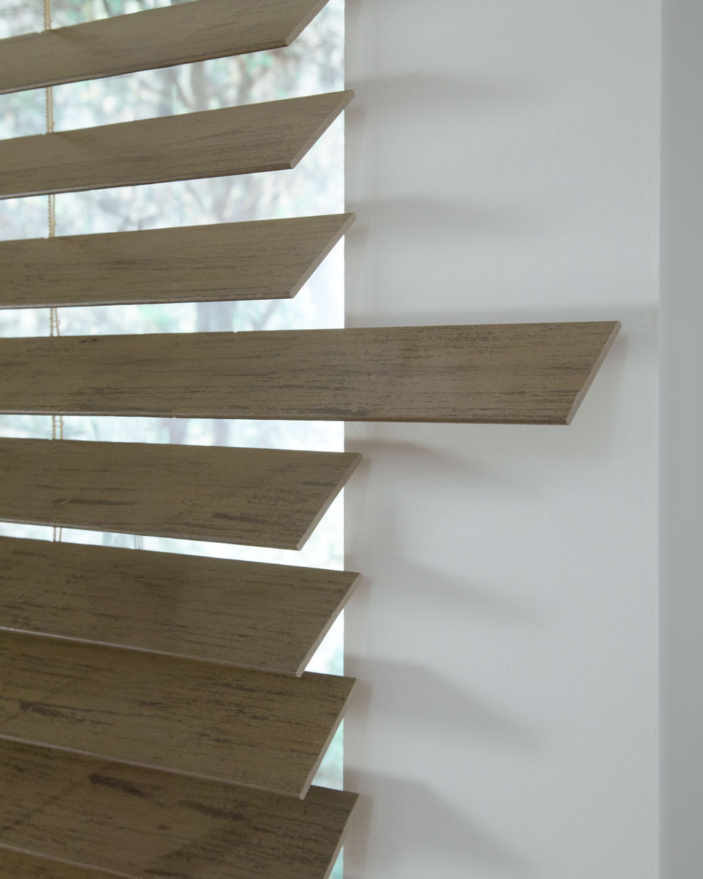 closeup of a dark brown Heartland Woods® Wood Blind