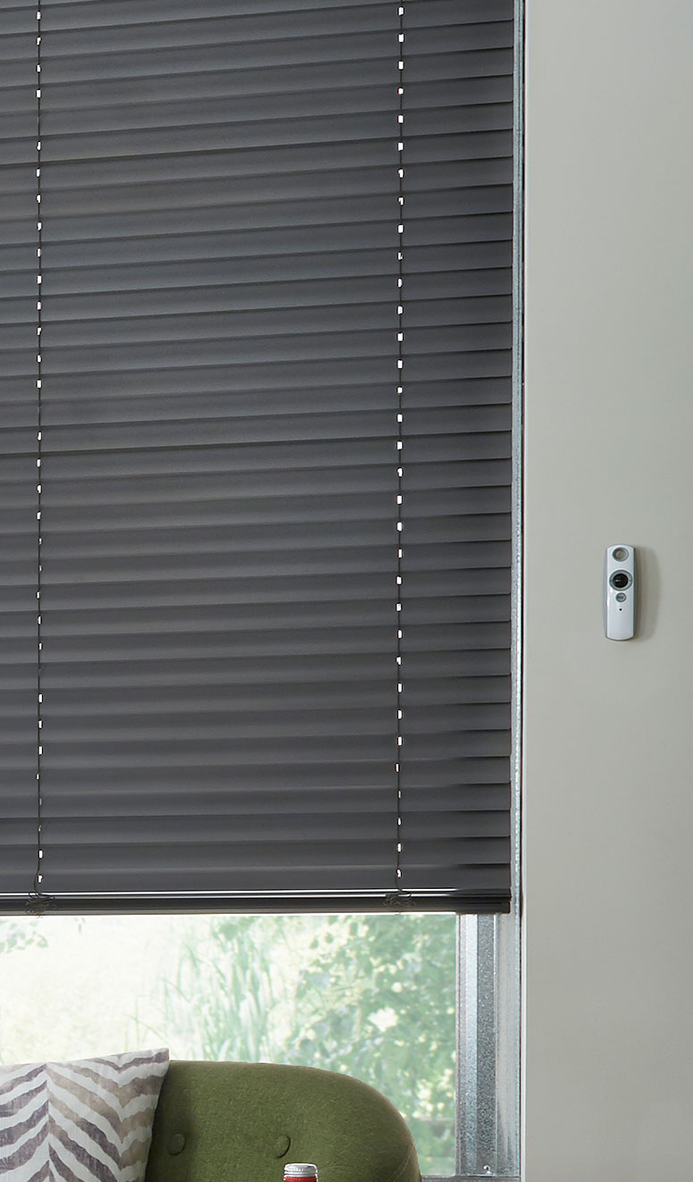 Close up of black Classic Collection® Motorized Aluminum Blinds
