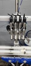 Inline_Filling_Systems_Semi_Automatic_Four_Head_Overflow_Liquid_Filler_3