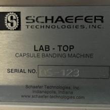 schaefer_sti_lab_top_capsule_bander_sealer_10