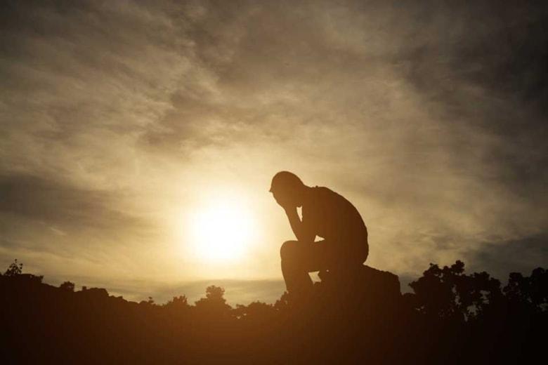 reflective-man-despair-sitting