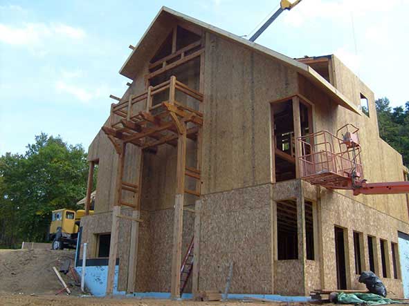Timber Framer uses Thermocore insulated wall and roof panels on own Wisconsin home project for energy efficiency
