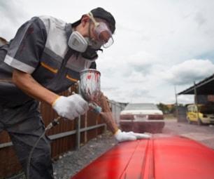 medium-shot-man-painting-car-door_23-2149714300 medium-shot-man-painting-car-door_23-2149714300