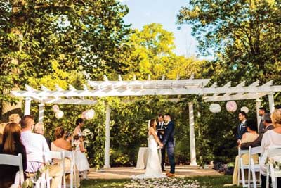 Outdoor wedding ceremony at The Lakefront Garden venue in Indianapolis
