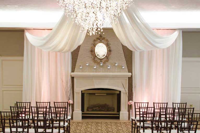 The Ballroom at The Willows hosts a white wedding ceremony in Indianapolis