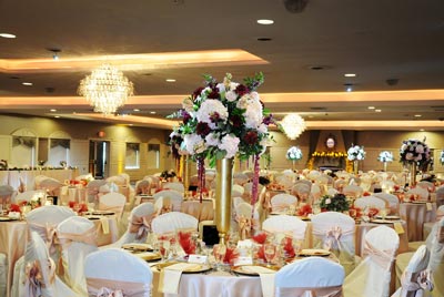 The Ballroom at The Willows decorated in pink for a formal wedding reception in Indiana