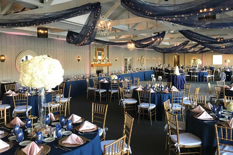 Modern wedding reception featuring navy at The Lodge at The Willows in Indianapolis