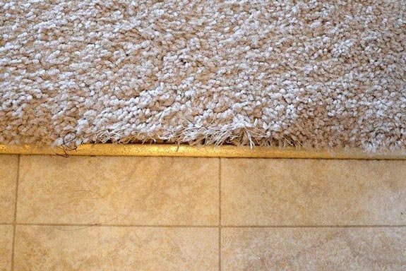 Carpet To Tile Transition Repairs, What Should I Put Between Carpet And Tile