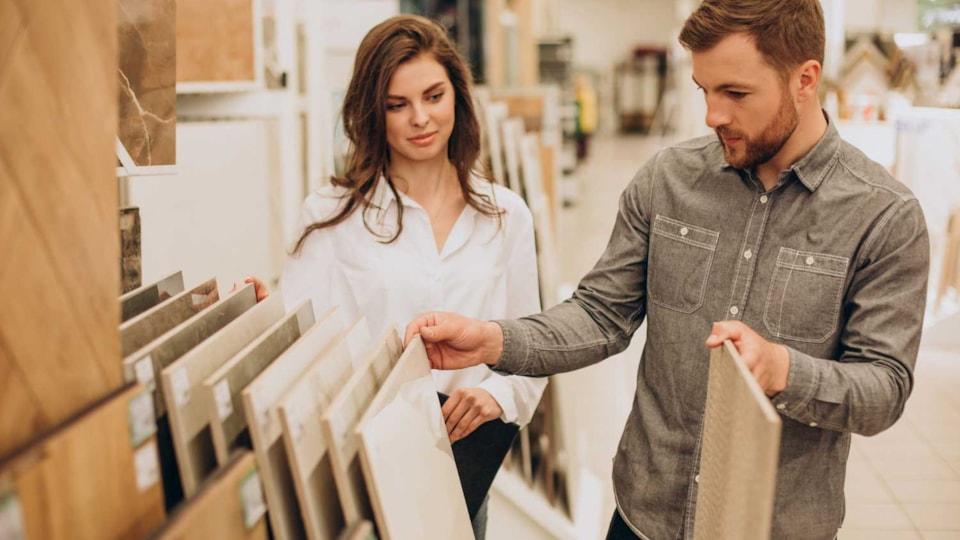 young-couple-choosing-tiles