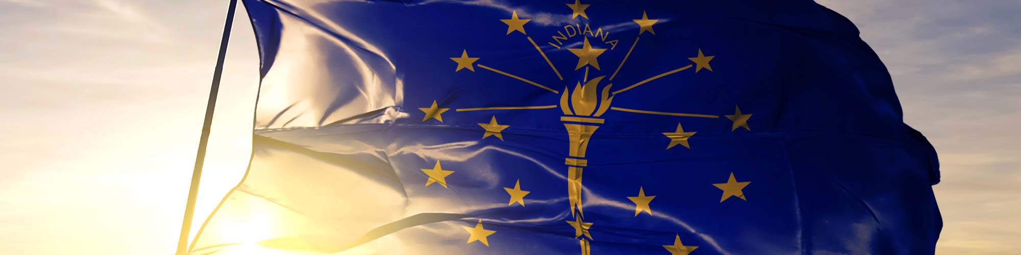 Indiana state flag at sunset