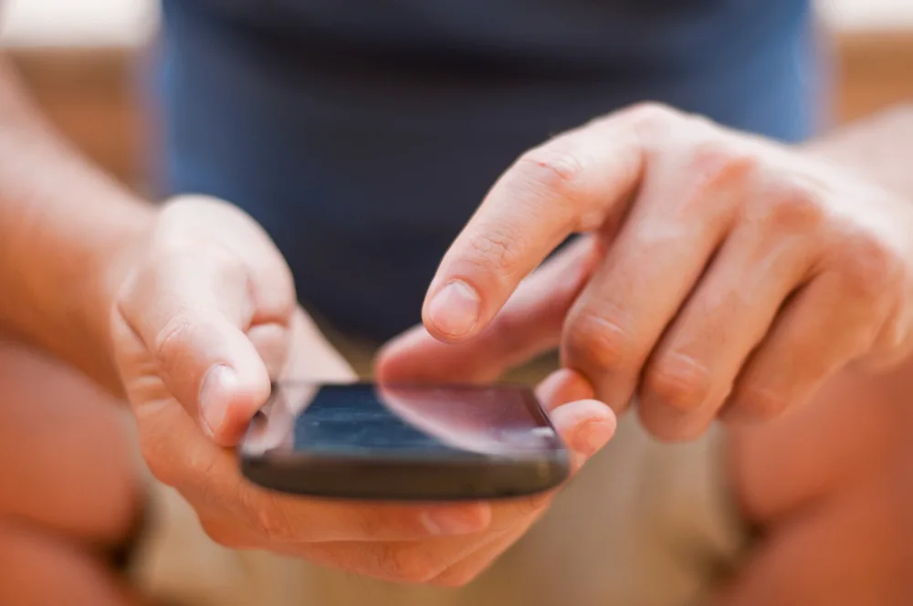 person-holding-a-smartphone