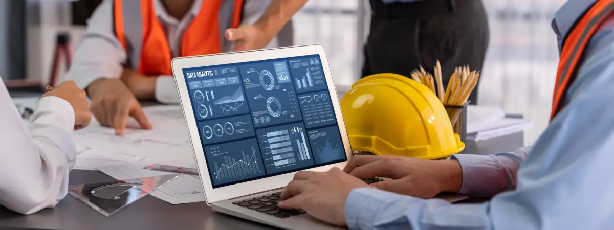 construction-person-typing-on-a-laptop