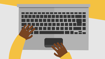 Blogger typing on his computer