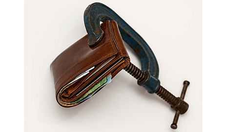 Wallet being squeezed by a vice