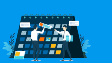 Two people working to plan and schedule their marketing tactics