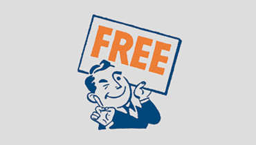 Man holding sign with "Free" on it while waving his finger "No"