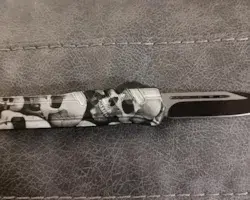 Skull Pile Automatic Knife image