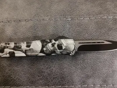 Skull Pile Automatic Knife image
