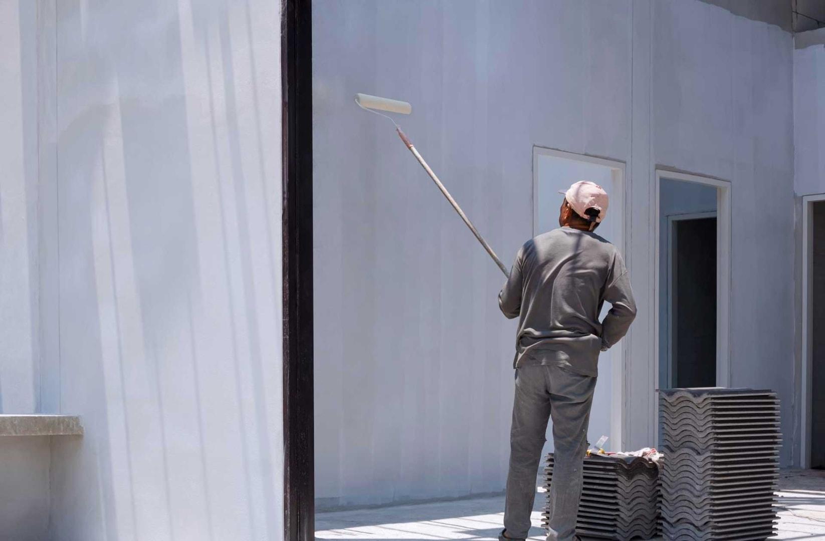 man-painting-exterior