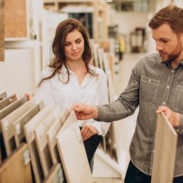 young-couple-choosing-tiles