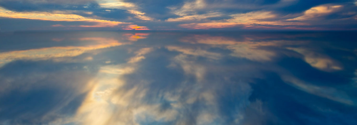 Sunrise over a body of water