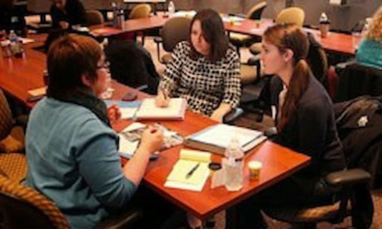 Group discussing leadership during training