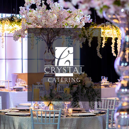 Crystal Catering company logo over one of their Indianapolis wedding reception events
