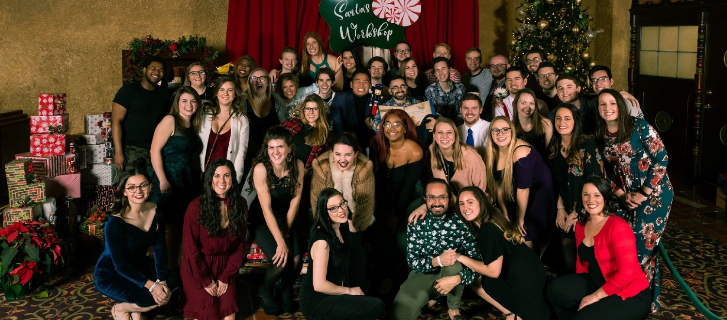 The Crane Bay Event Team posing at their holiday party